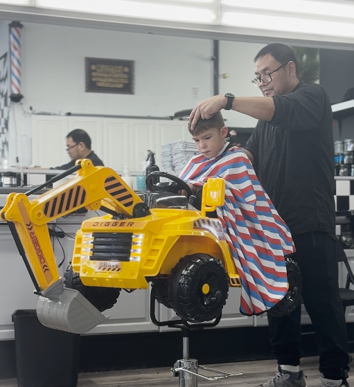 Another young client getting a fresh cut at The Barbershop FSJ, Fort St John BC